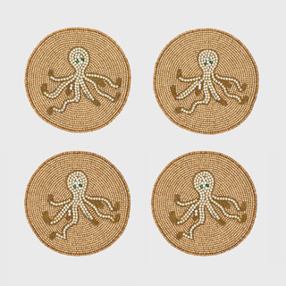 This is a gold tableware by Joanna Buchanan called octopus coaster, set of four in standard