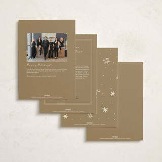 This is a champagne business holiday cards with standard by Ani Somi called a very merry holiday cheers printing on signature in standard