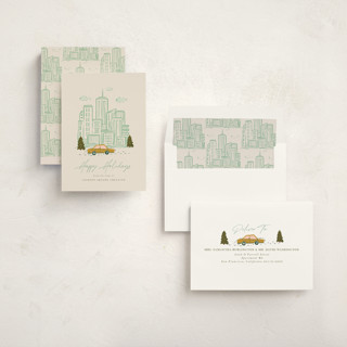 This is a moss business holiday cards with standard by Vera Lim called in the city printing on signature in standard