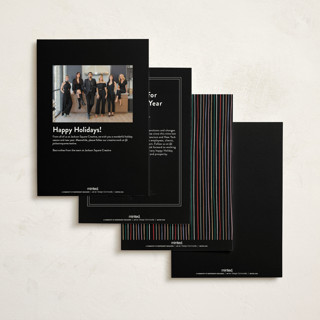 This is a eclipse business holiday cards with standard by Pixel and Hank called holiday city printing on signature in standard