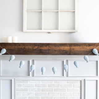 This is a blue holiday decorations by Nivas Collection called balloon garland (dusty blue, 6 feet) in standard