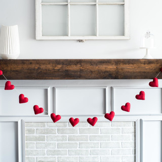 This is a red holiday decorations by Nivas Collection called heart garland (red, 6 feet) in standard