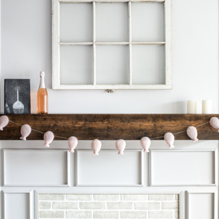 This is a pink holiday decorations by Nivas Collection called balloon garland (pink, 6 feet) in standard