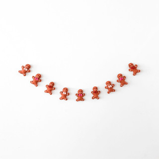 This is a brown holiday decorations by Jollity and Co called jolly gingerbread wool felt garland - set of 1 in standard