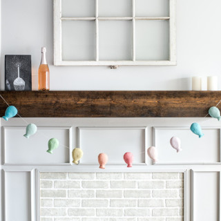 This is a multicolor holiday decorations by Nivas Collection called balloon garland (soft rainbow, 6 feet) in standard