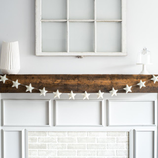 This is a white holiday decorations by Nivas Collection called star garland (off-white, 6 feet) in standard