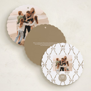 This is a starlight holiday card ornaments with foil pressed by Pink House Press called bow frame printing on recycled smooth signature in ornament