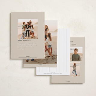 This is a tinsel foil pressed holiday cards with foil pressed by Kelly Schmidt called sideways merry printing on recycled smooth signature in standard