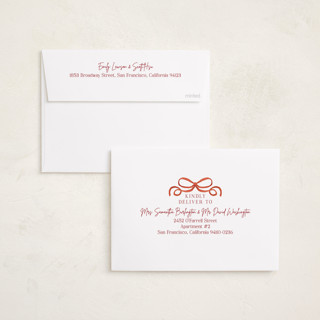 This is a scarlet foil pressed holiday cards with foil pressed by Elly called winter ribbon printing on recycled smooth signature in standard