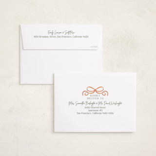 This is a peach foil pressed holiday cards with foil pressed by Elly called winter ribbon printing on recycled smooth signature in standard