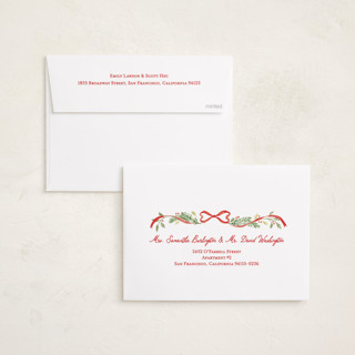 This is a cardinal foil pressed holiday cards with foil pressed by Sarah Knight called ribbon arch printing on recycled smooth signature in standard