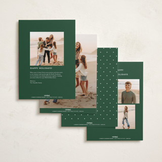 This is a holly foil pressed holiday cards with foil pressed by Emily Betts called bow two printing on recycled smooth signature in standard