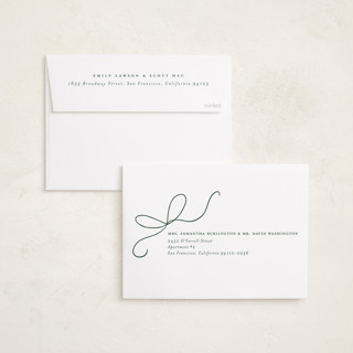 This is a holly foil pressed holiday cards with foil pressed by Emily Betts called bow two printing on recycled smooth signature in standard