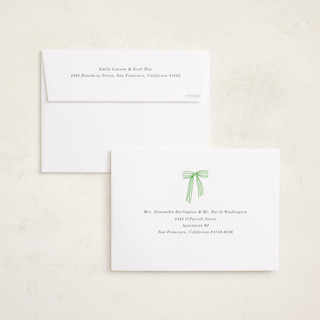 This is a evergreen foil pressed holiday cards with foil pressed by Baumbirdy called bows printing on recycled smooth signature in standard