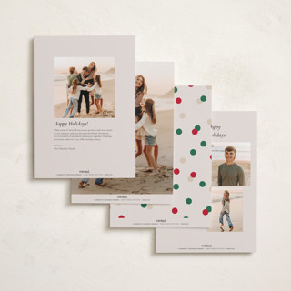 This is a ivory foil pressed holiday cards with foil pressed by Katie Zimpel called vintage confetti printing on recycled smooth signature in standard