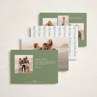 This is a snow foil pressed holiday cards with foil pressed by Everett Paper Goods called laurel garland printing on recycled smooth signature in standard
