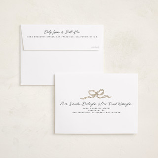 This is a vanilla foil pressed holiday cards with foil pressed by Creo Study called shimmering bow tie printing on recycled smooth signature in standard