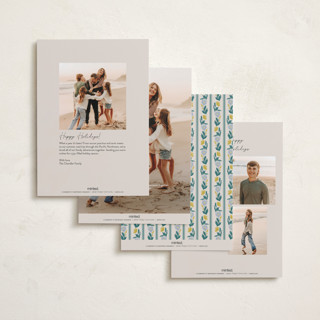 This is a buttercup foil pressed holiday cards with foil pressed by Amy Kross called laurel edge printing on recycled smooth signature in standard