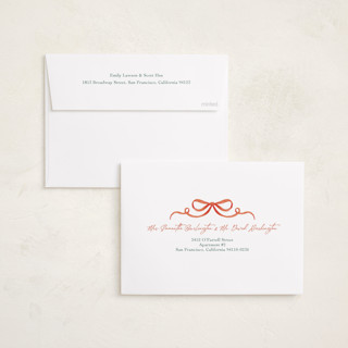 This is a holly foil pressed holiday cards with foil pressed by Elly called a gentle bow printing on recycled smooth signature in standard