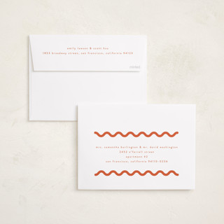 This is a papaya foil pressed holiday cards with foil pressed by Blustery August called party squiggle printing on recycled smooth signature in standard