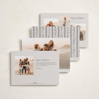 This is a marshmallow foil pressed holiday cards with foil pressed by Laura Hankins called gilt greens printing on recycled smooth signature in standard