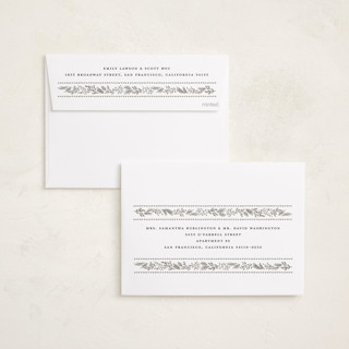 This is a marshmallow foil pressed holiday cards with foil pressed by Laura Hankins called gilt greens printing on recycled smooth signature in standard