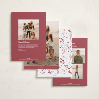 This is a crimson foil pressed holiday cards with foil pressed by Cass Loh called holly whirl printing on recycled smooth signature in standard