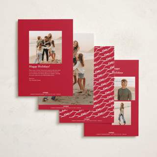 This is a cardinal foil pressed holiday cards with foil pressed by Kaydi Bishop called bow tied printing on recycled smooth signature in standard