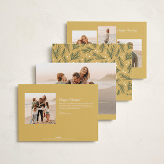 This is a golden foil pressed holiday cards with foil pressed by Everett Paper Goods called simply delighted printing on recycled smooth signature in standard