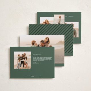 This is a juniper foil pressed holiday cards with foil pressed by Leia Matt called tied with joy printing on recycled smooth signature in standard