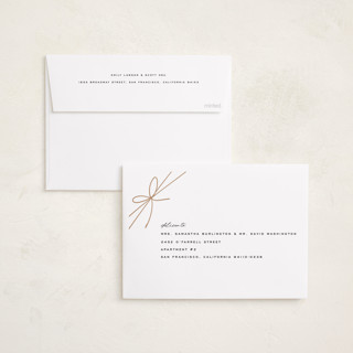 This is a woolen foil pressed holiday cards with foil pressed by Leia Matt called tied with joy printing on recycled smooth signature in standard