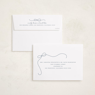 This is a marine foil pressed holiday cards with foil pressed by Lauren Chism called cascading bow printing on recycled smooth signature in standard