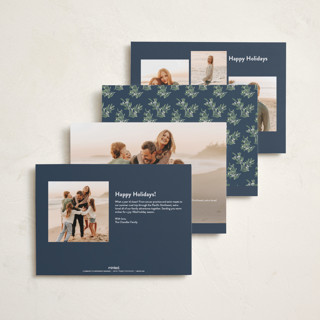 This is a navy foil pressed holiday cards with foil pressed by Sarah Brown called a little married printing on recycled smooth signature in standard