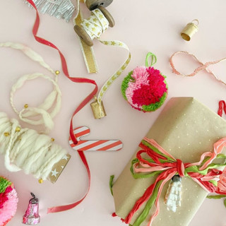 This is a multicolorassorted-colors holiday decorations by Jollity and Co called gift topper kit x collab with kelsey klos in standard