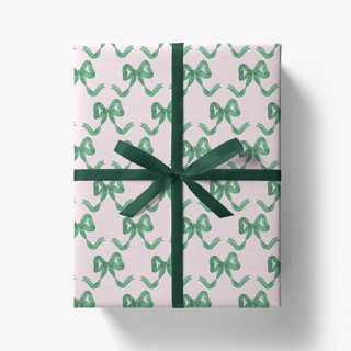 This is a pink wrapping paper by Liesel Anne called pink and green bows gift wrap [roll of 3 sheets] in standard
