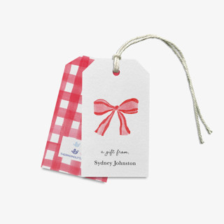 This is a red wrapping paper by Liesel Anne called red bow personalized gift tags in standard