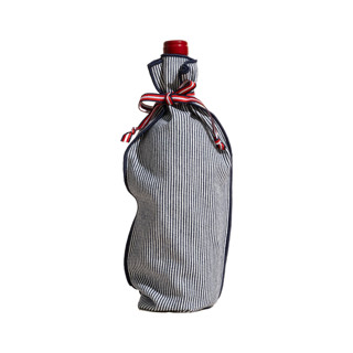 This is a blue wrapping paper by ATELIER SAUCIER called indigo stripe bottle bag in standard