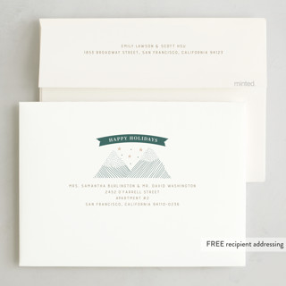 This is a wreath letterpress holiday cards with letterpress by Sabrin Deirani called snow mountains printing on bright white letterpress paper in standard