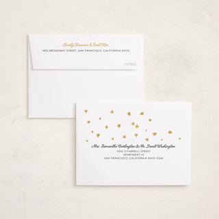 This is a golden petite holiday cards with standard by Erika Firm called new year headband printing on recycled smooth signature in petite