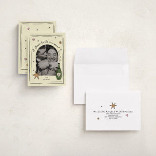 This is a champagne petite holiday cards with standard by Helena Vitto called drunk in love printing on recycled smooth signature in petite