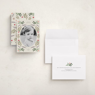 This is a buttercream petite holiday cards with standard by Lindsay Megahed called merry round printing on signature in petite