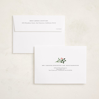 This is a buttercream petite holiday cards with standard by Lindsay Megahed called merry round printing on signature in petite