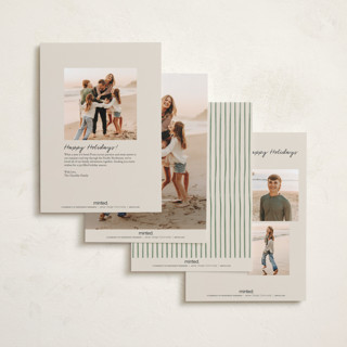 This is a moss petite holiday cards with standard by Chris Griffith called holiday wrap printing on signature in petite