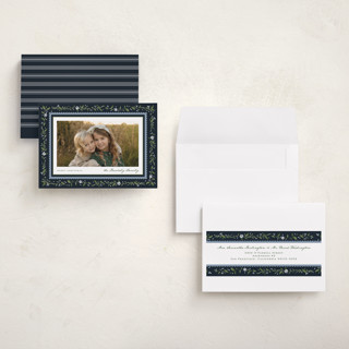 This is a deep blue petite holiday cards with standard by Erin L. Wilson called hollywick printing on recycled smooth signature in petite