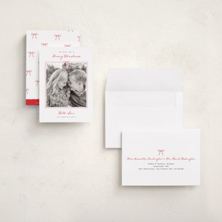 This is a berry petite holiday cards with standard by Kelly Schmidt called love bow printing on recycled smooth signature in petite