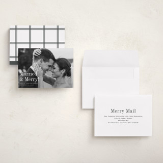 This is a snow petite holiday cards with standard by Megan Davis called eternally merry printing on recycled smooth signature in petite