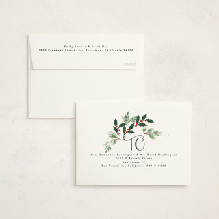 This is a wreath petite holiday cards with standard by Rebecca Durflinger called a very merry christmas botanicals printing on signature in petite