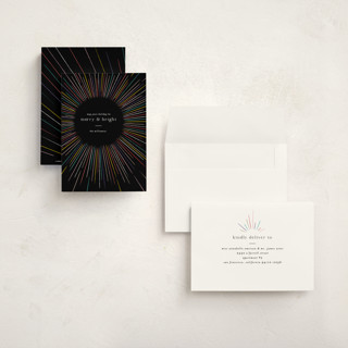 This is a disco petite holiday cards with standard by Pixel and Hank called burst printing on signature in petite