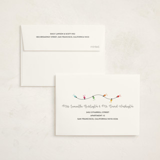 This is a charcoal petite holiday cards with standard by Corinne Malesic called twinkling new home printing on signature in petite