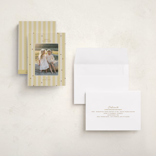 This is a butter petite holiday cards with standard by Ellen Schlegelmilch called stars & stripes printing on recycled smooth signature in petite